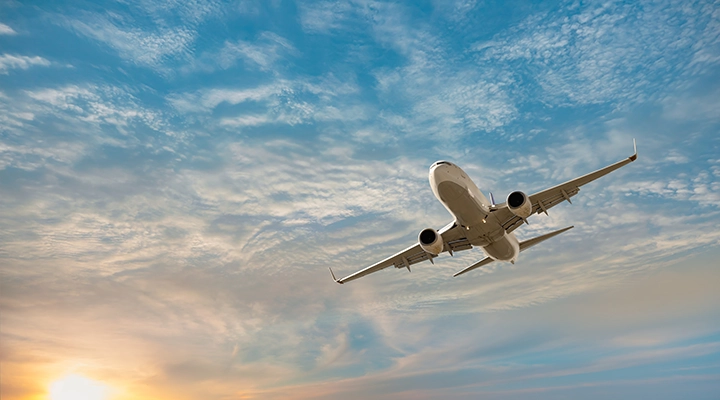 Airplane flying in the sky.